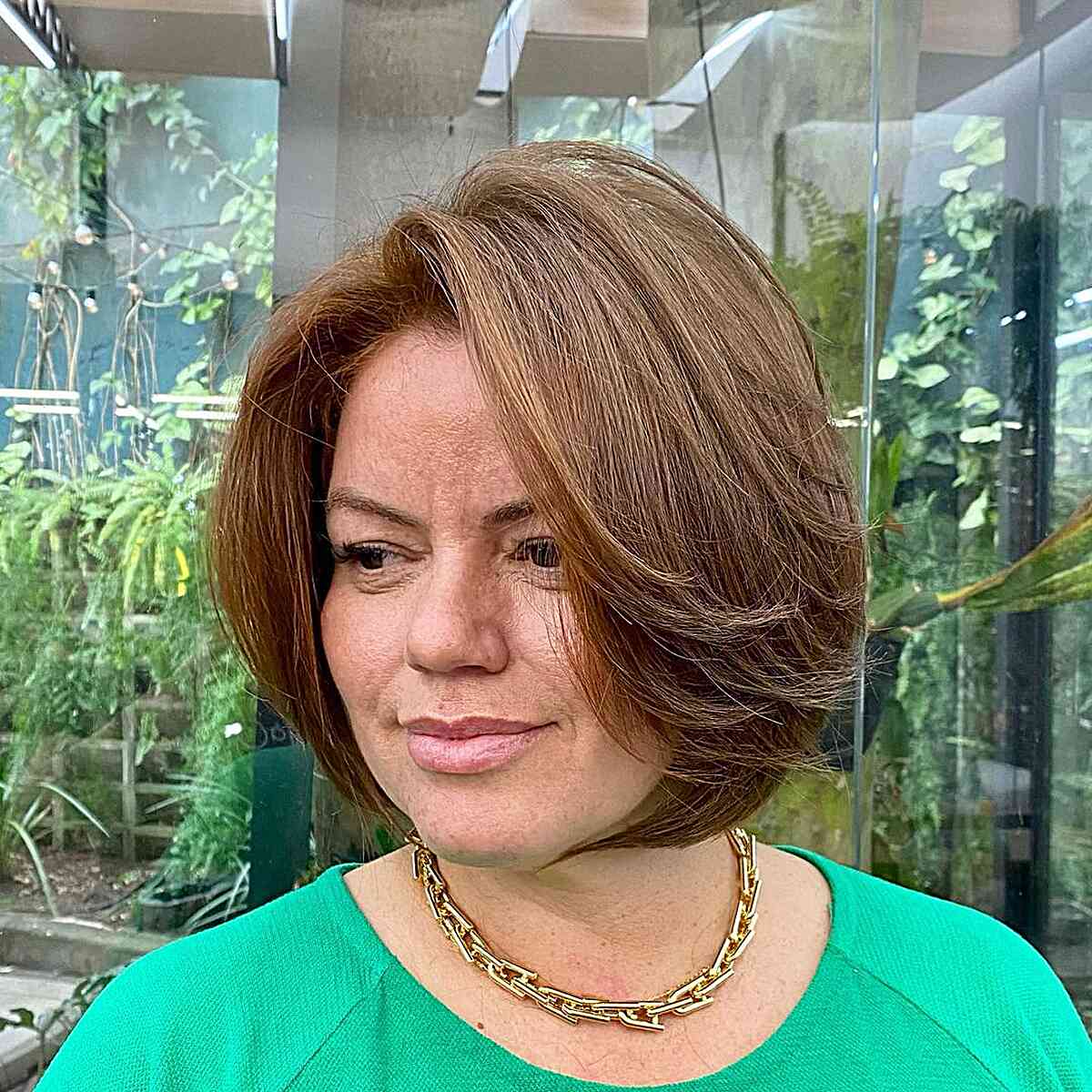 Face-Framing Brunette Bubble Bob for Mature Women with Short Hair