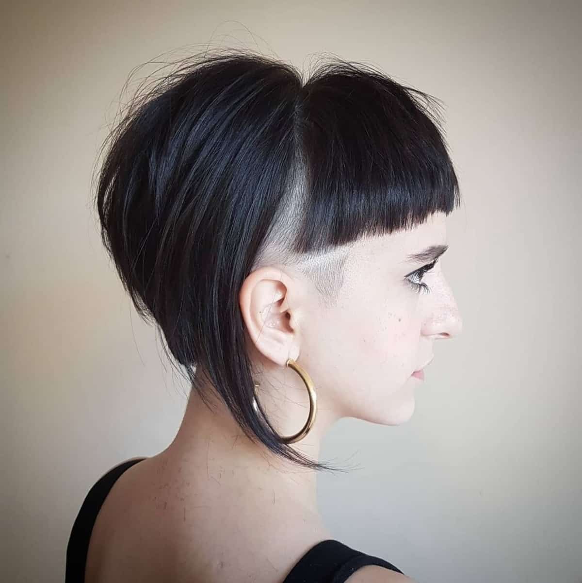 Asymmetrical bob with bangs and an undercut