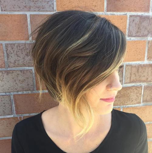 wispy asymmetrical brown bob with blonde balayage