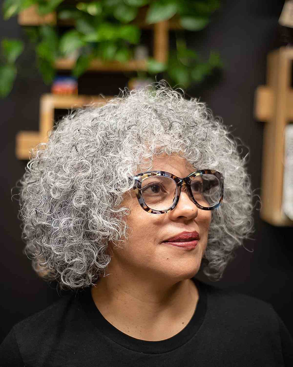 Grey Stacked Short Curly Bob for Women Over 70 with Glasses