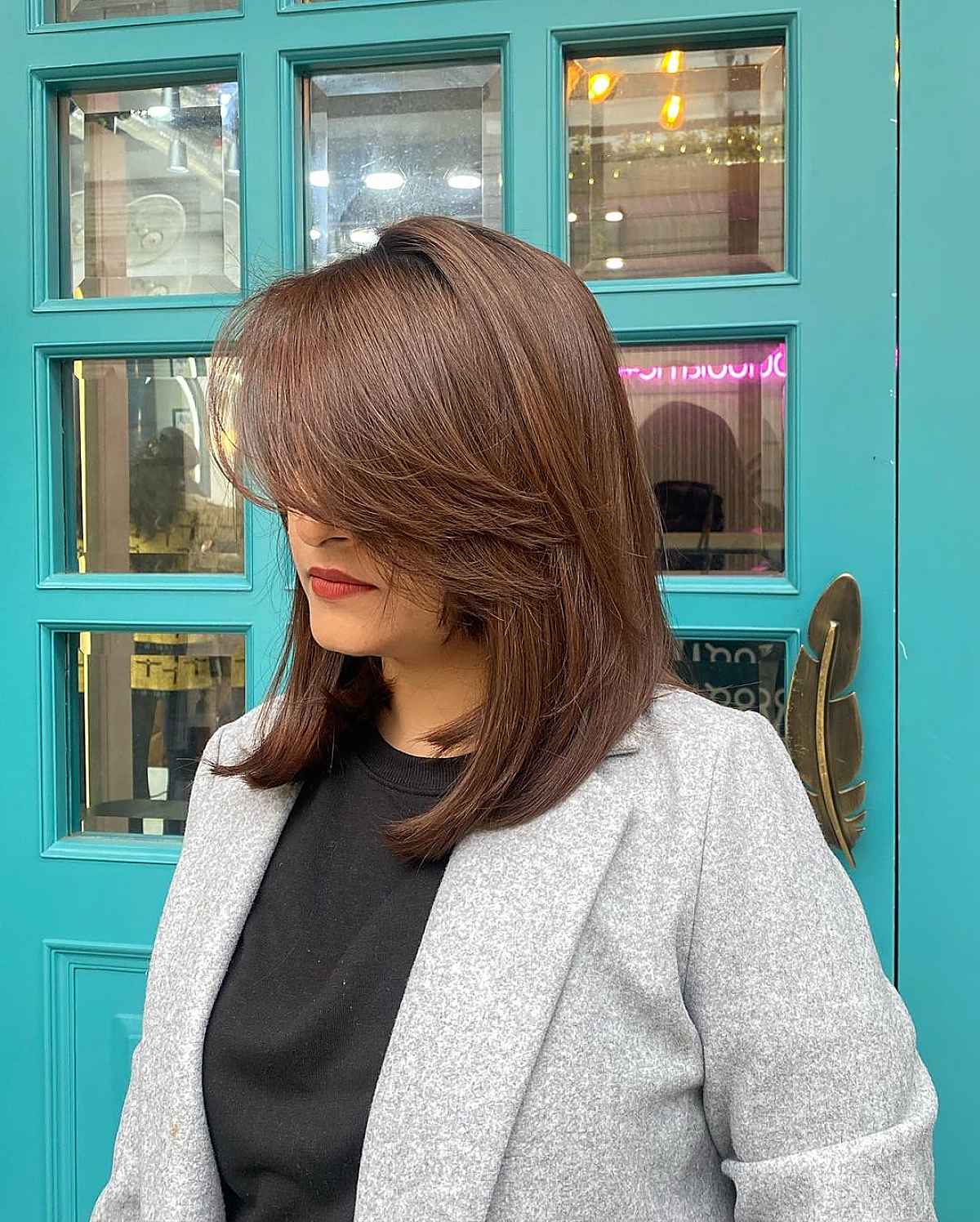 Angled Lob Haircut with Long Layered Bangs