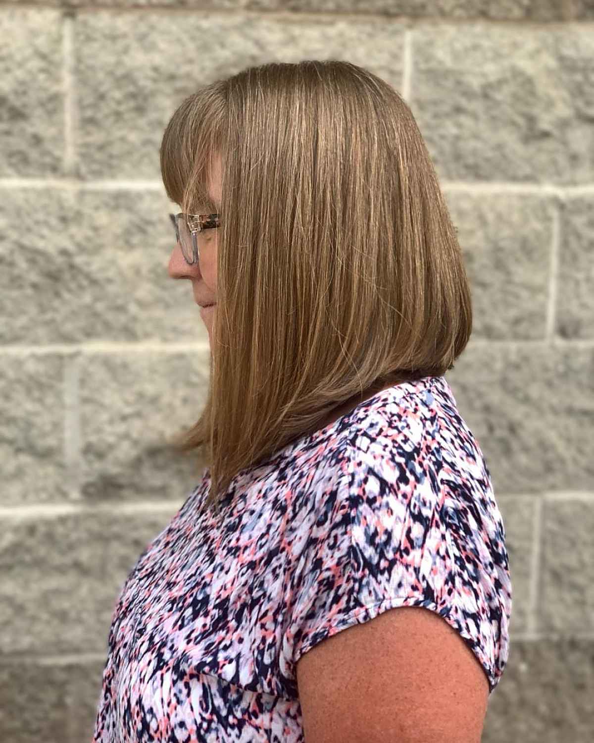 Shoulder-Length Angled Bob with Bangs 