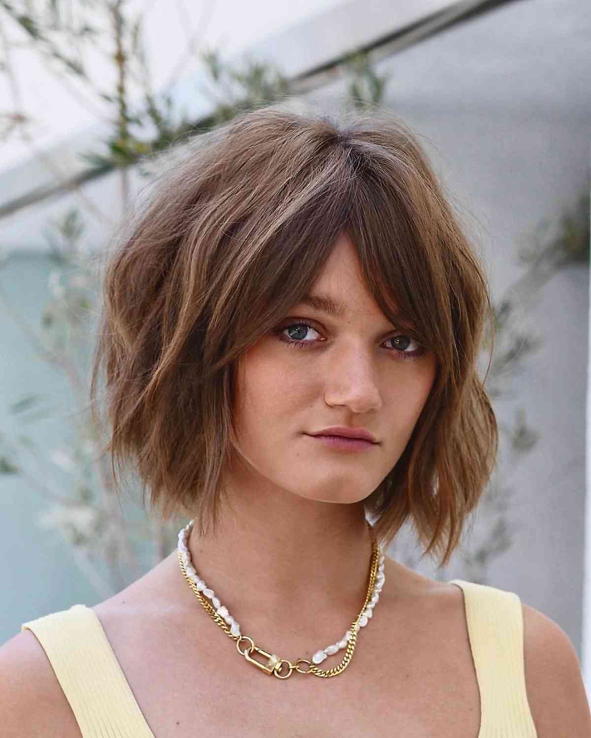 Chin-Length Layered Messy Bob with Curtain Bangs