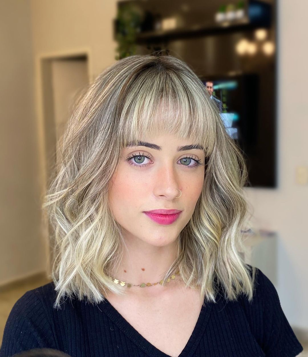 Blonde Wavy Lob with Arched Bangs