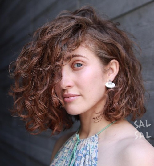 Mesmerizing Side Parted Curly Style