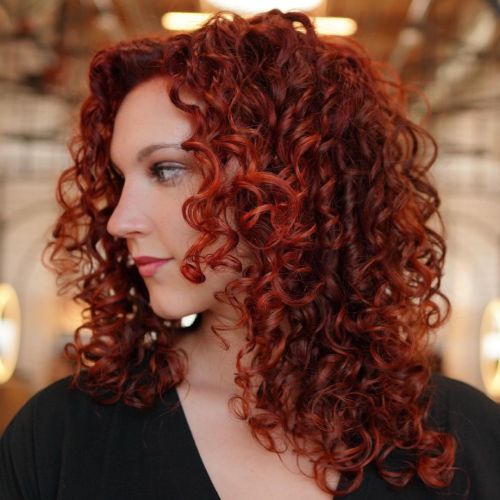 Fiery Red Layered Style on Curly Hair Texture