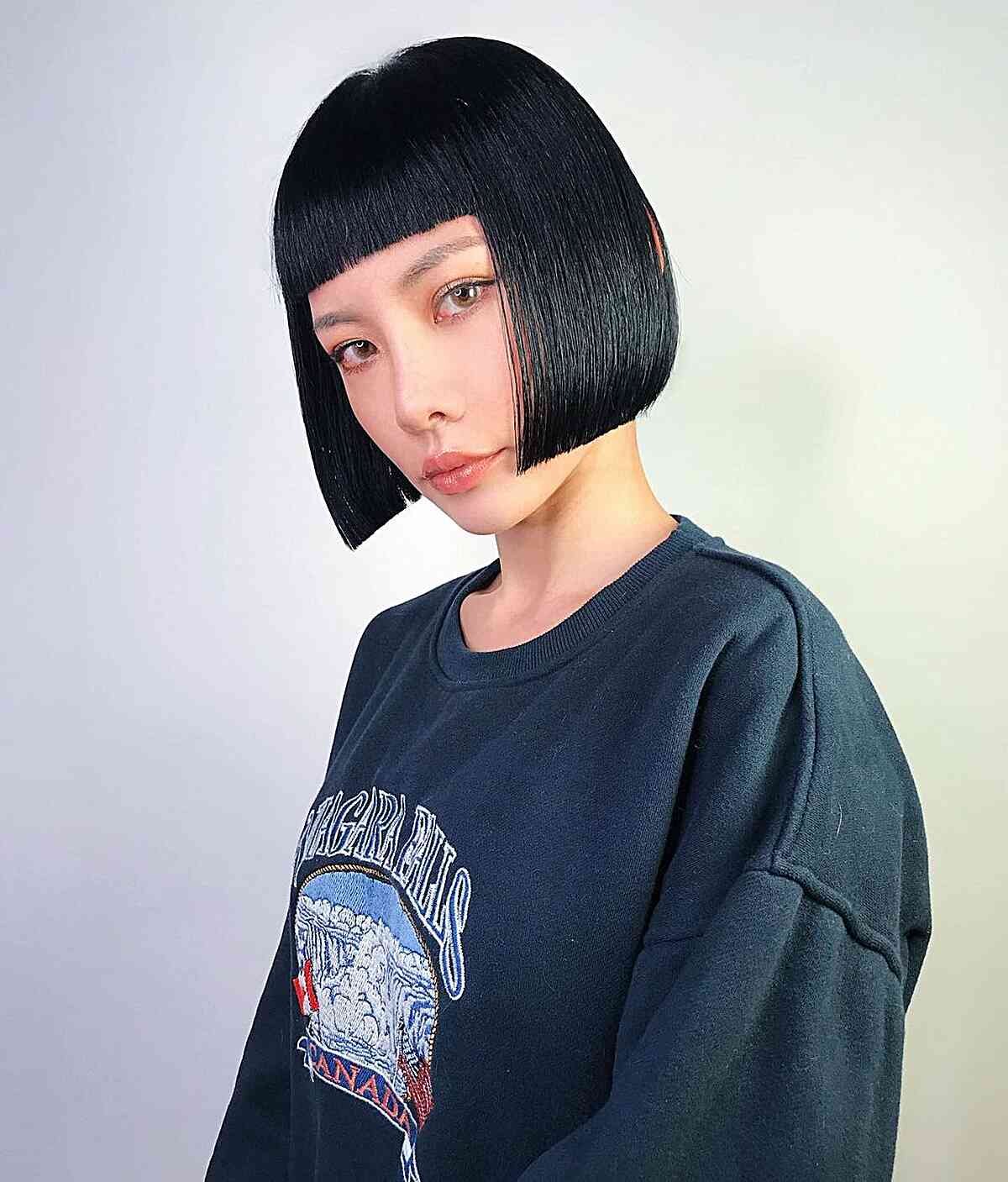 Jaw-Length Box Bobbed Cut with Short Bangs