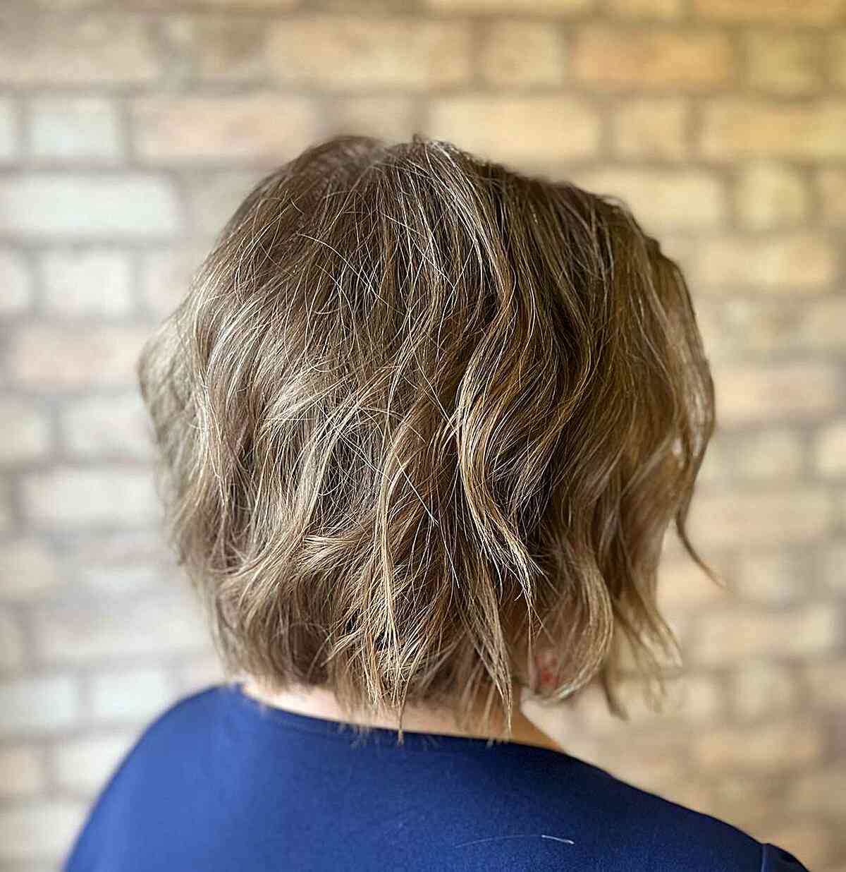 Neck-Length Wavy Textured Bob with Choppy Layers