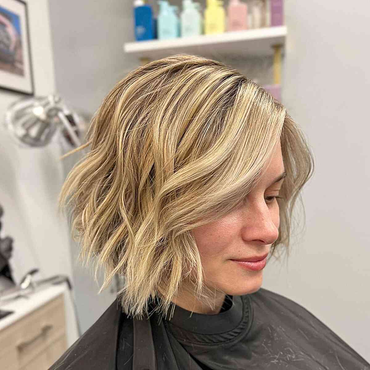 Blonde Wavy Short Bobbed Hair with Long Bangs and Angled Layers