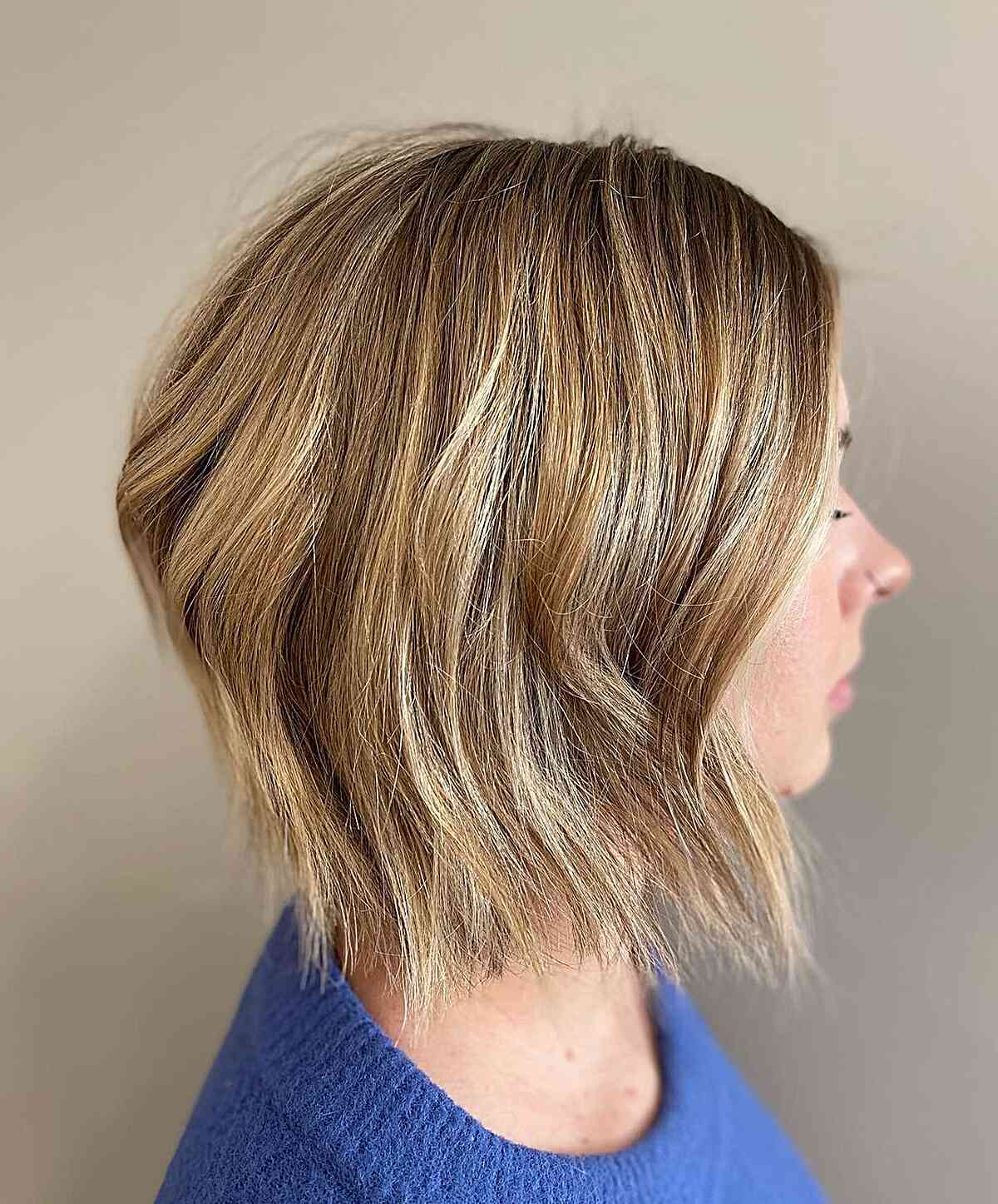 Neck-Grazing Golden Blonde Textured Bob with Choppy Ends