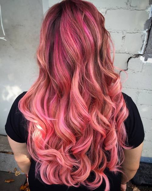 long brown hair with pink balayage highlights