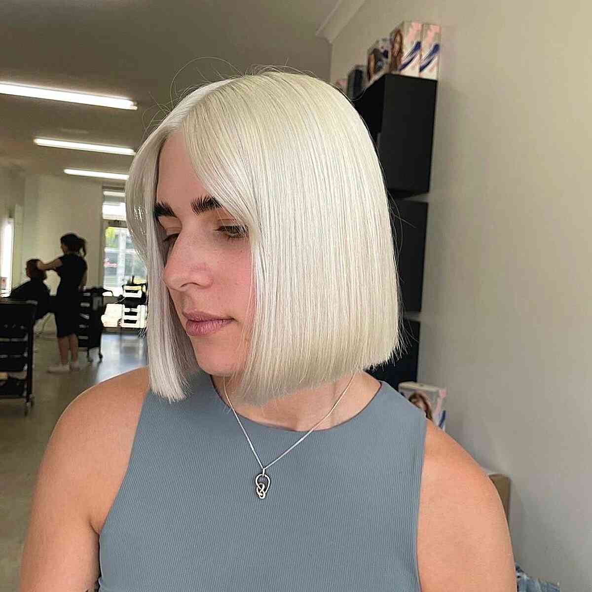 Barbie Blonde with Neck-Length Boyfriend Blunt Bob Cut