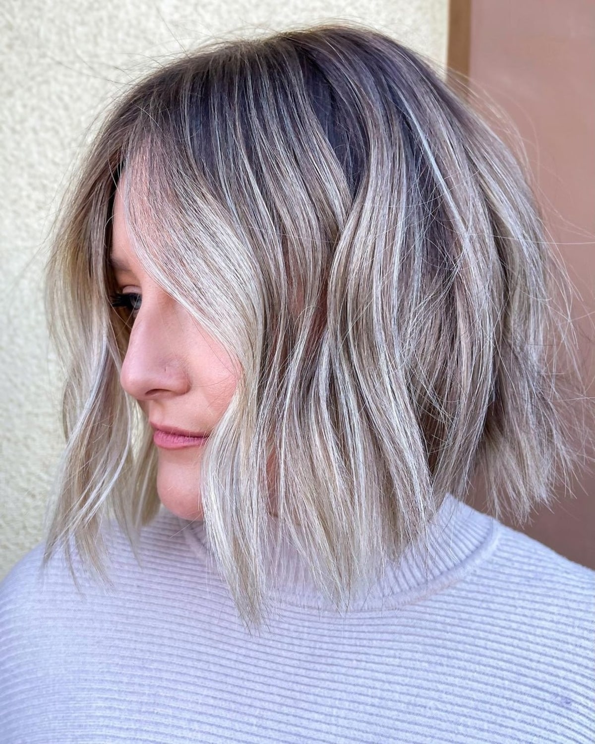 Ash blonde wavy choppy short bob