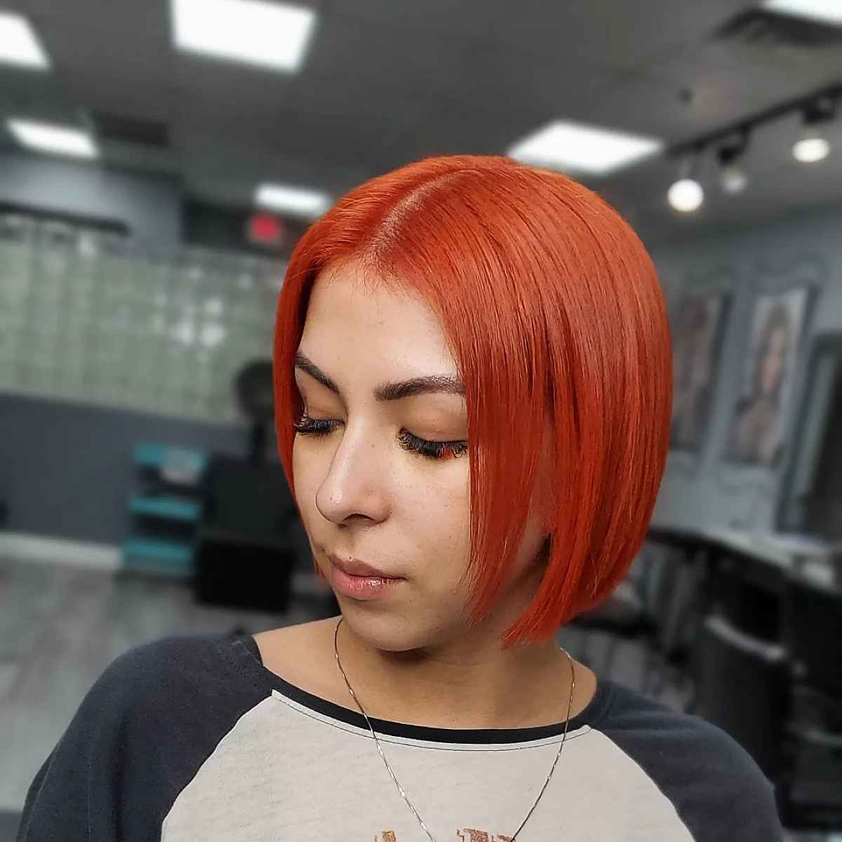 Straight Blunt Cut on Bright Copper Hair