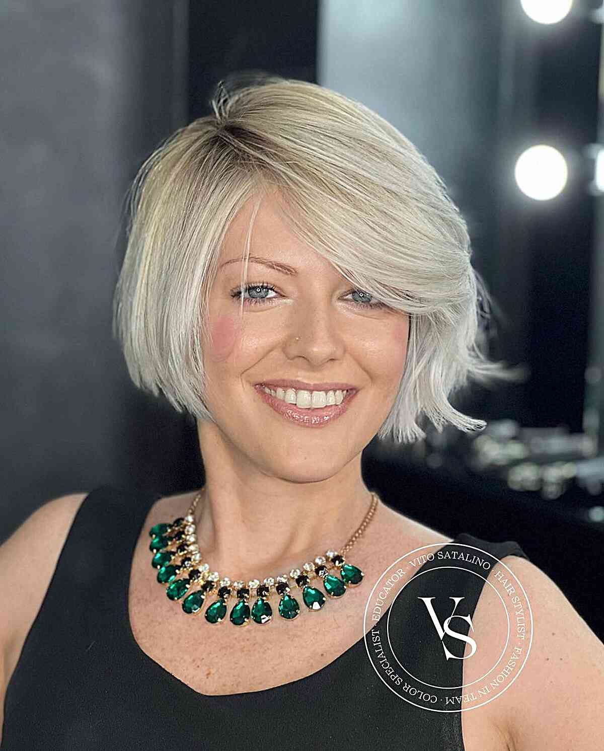 Jaw-Length Blunt Bob Chop with Sweeping Fringe