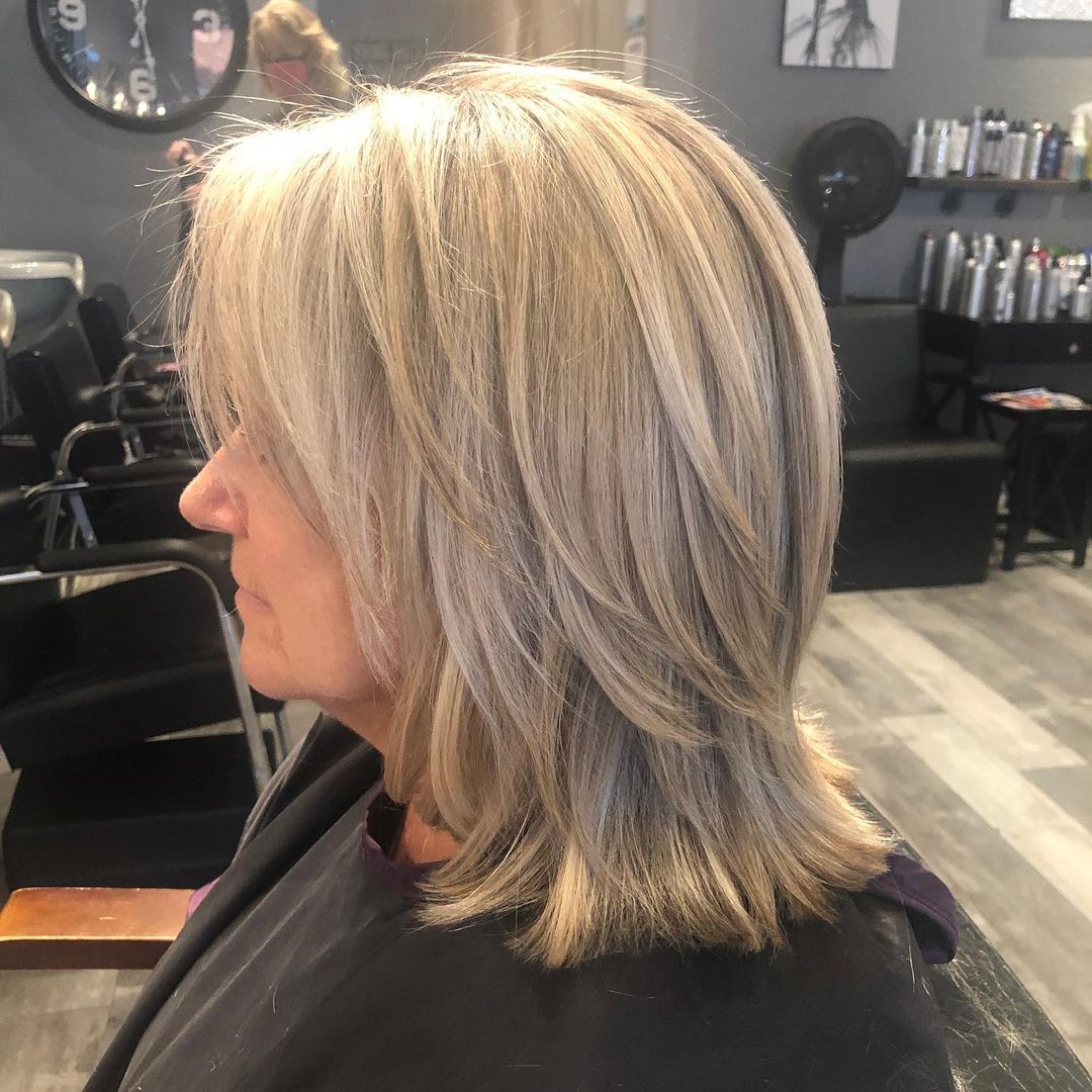 Medium Layered Haircut for 60-Year-Old Women