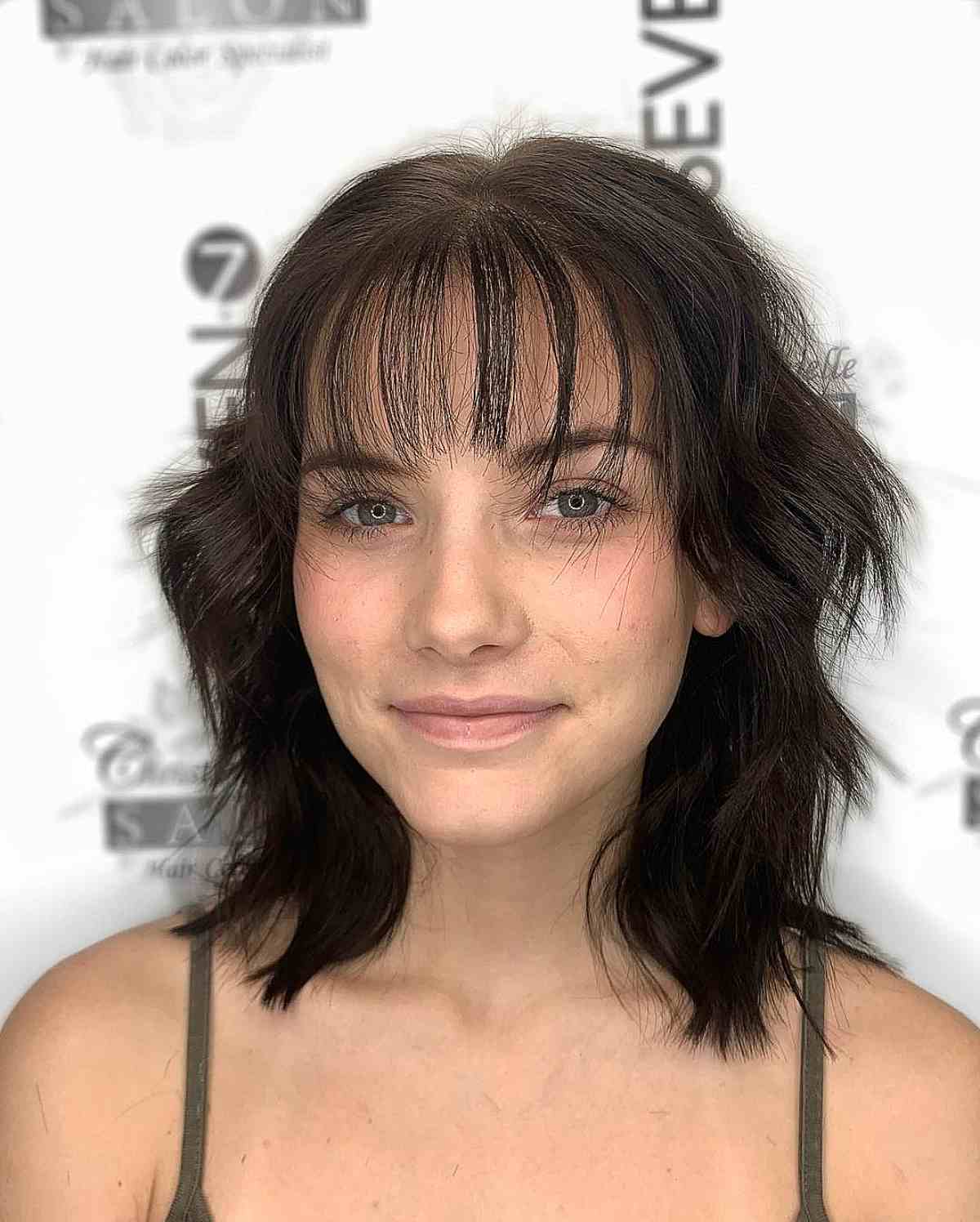 Shoulder-Length Hair with Short Layers and Light See-Through Bangs