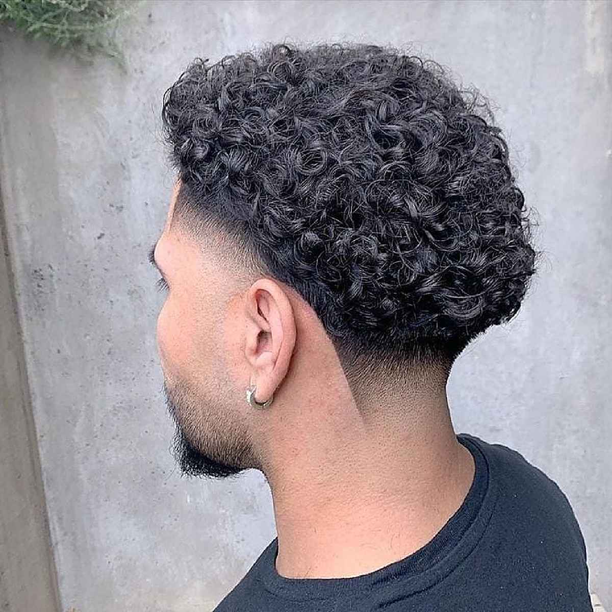 Mid-low fade for afro curls