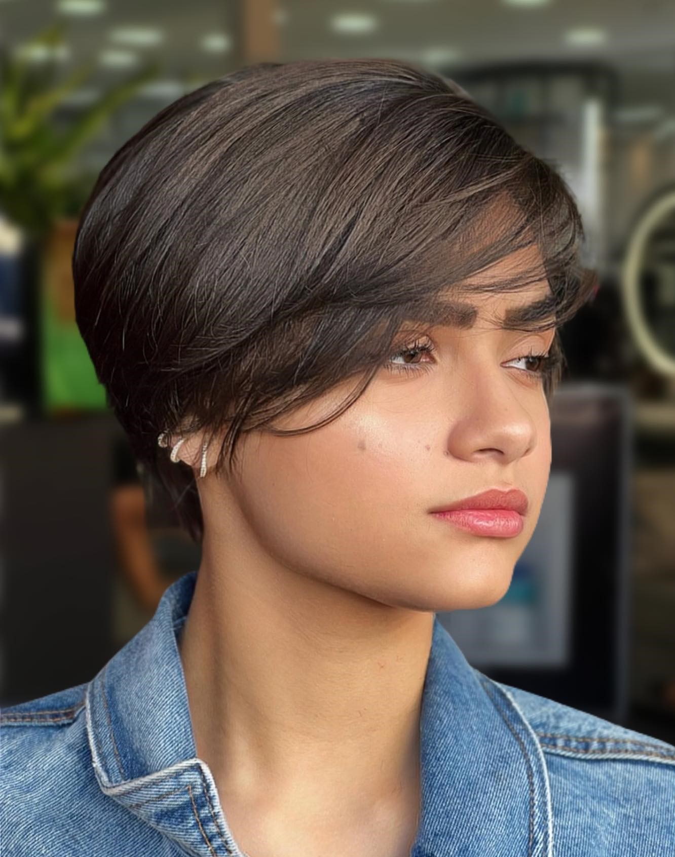 Short Hairstyle with Side Bangs for Round Faces