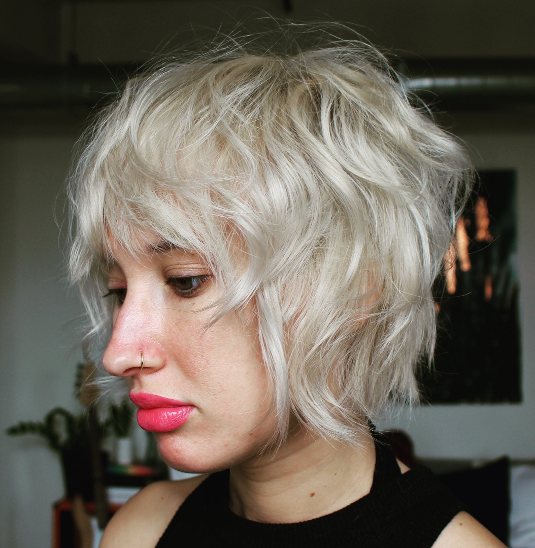 Short Blonde Inverted Tousled Shag with Bangs