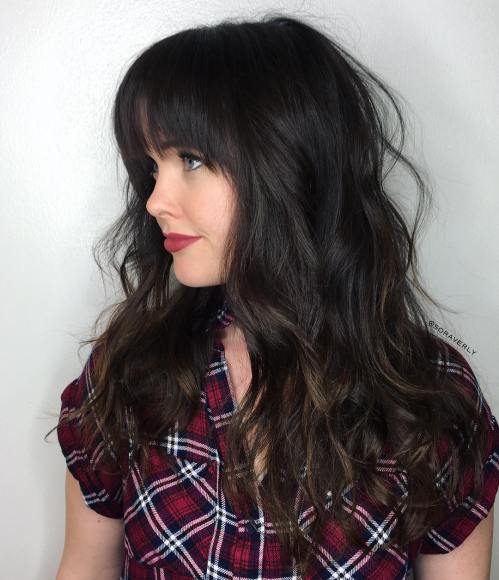 Medium Layered Haircut With Long Bangs