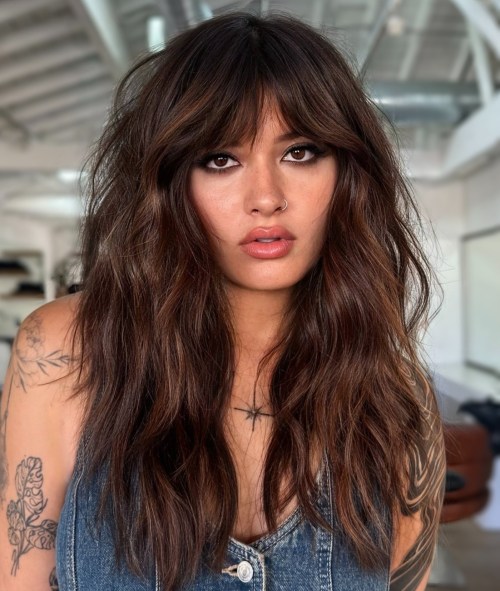 Voluminous Long Wavy Wolf Cut with Bangs