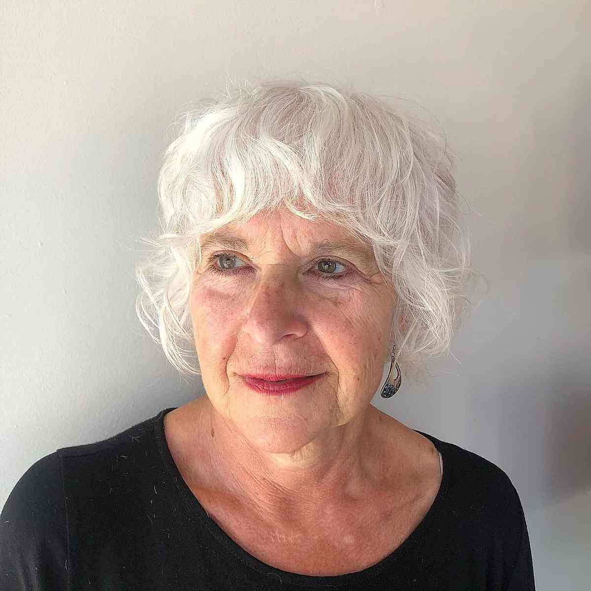 Short Face-Framing Shag with Wavy Bangs for Women Over 70