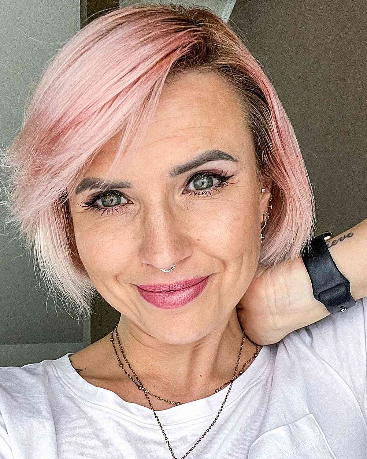 Short Pastel Pink Sweeping Bob Cut for Ladies Aged 50 with Fine Hair