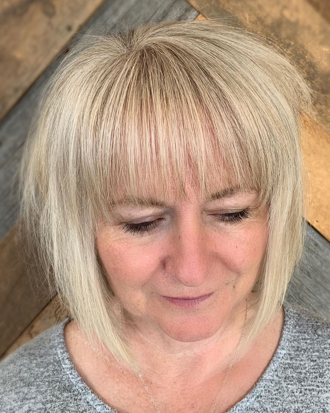 Medium to Short Haircut with Bangs for Ladies 50 and Over