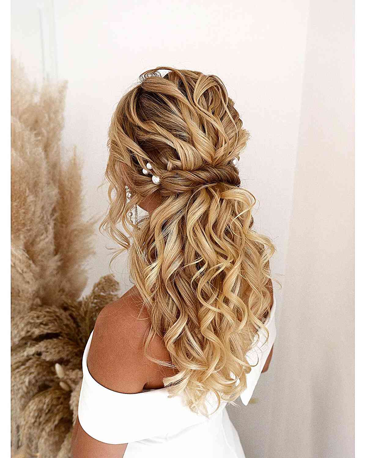 Cascading Curls Half Updo