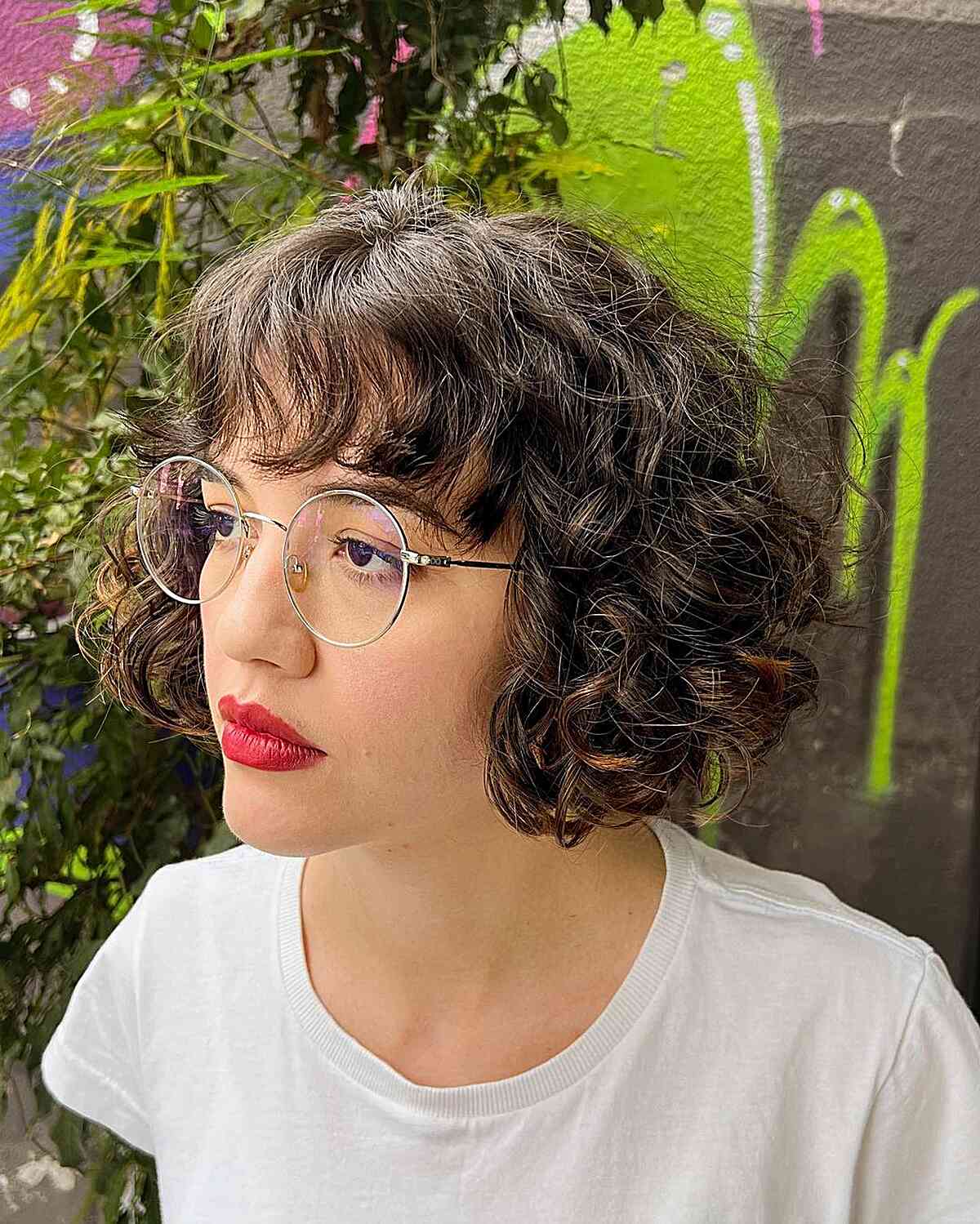 Chin-Length Curly Bob with Wavy Bangs