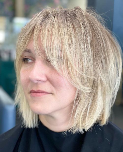 Buttery Blonde Layered Bob Cut