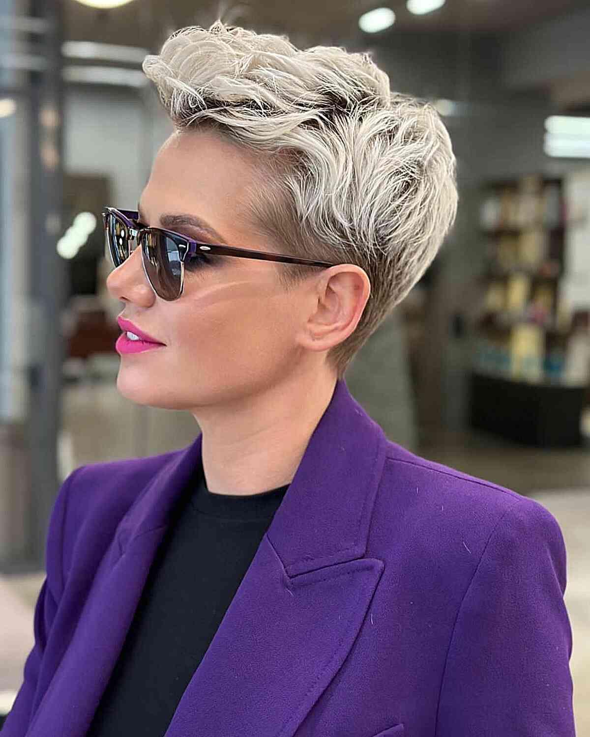 Feminine Diva-Inspired Platinum Pixie for women with short hair and dark roots