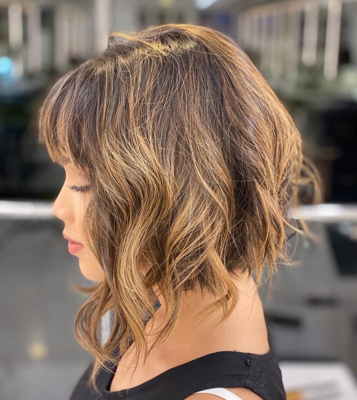 Wavy stacked bob with bangs