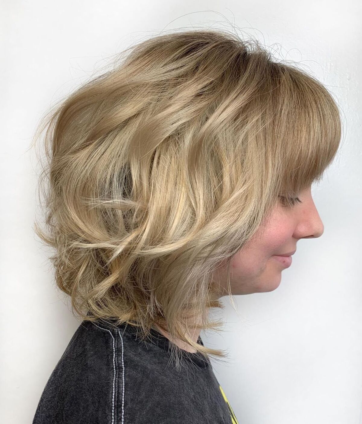 Messy Long Stacked Bob with Bangs