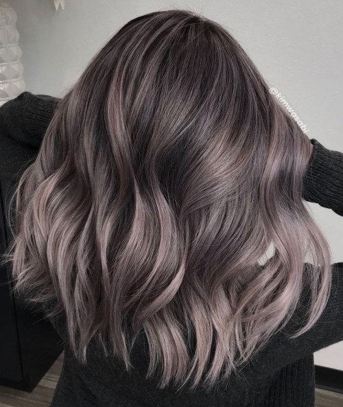 Sliver and Ashy Hues on Long Wavy Hair