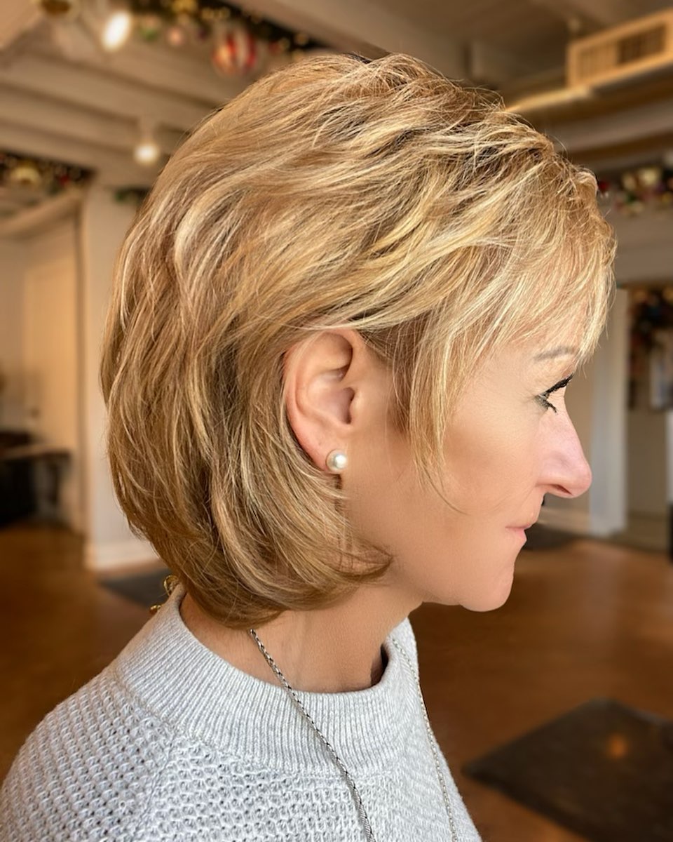 Chin-Length Layered Honey Blonde Hairstyle