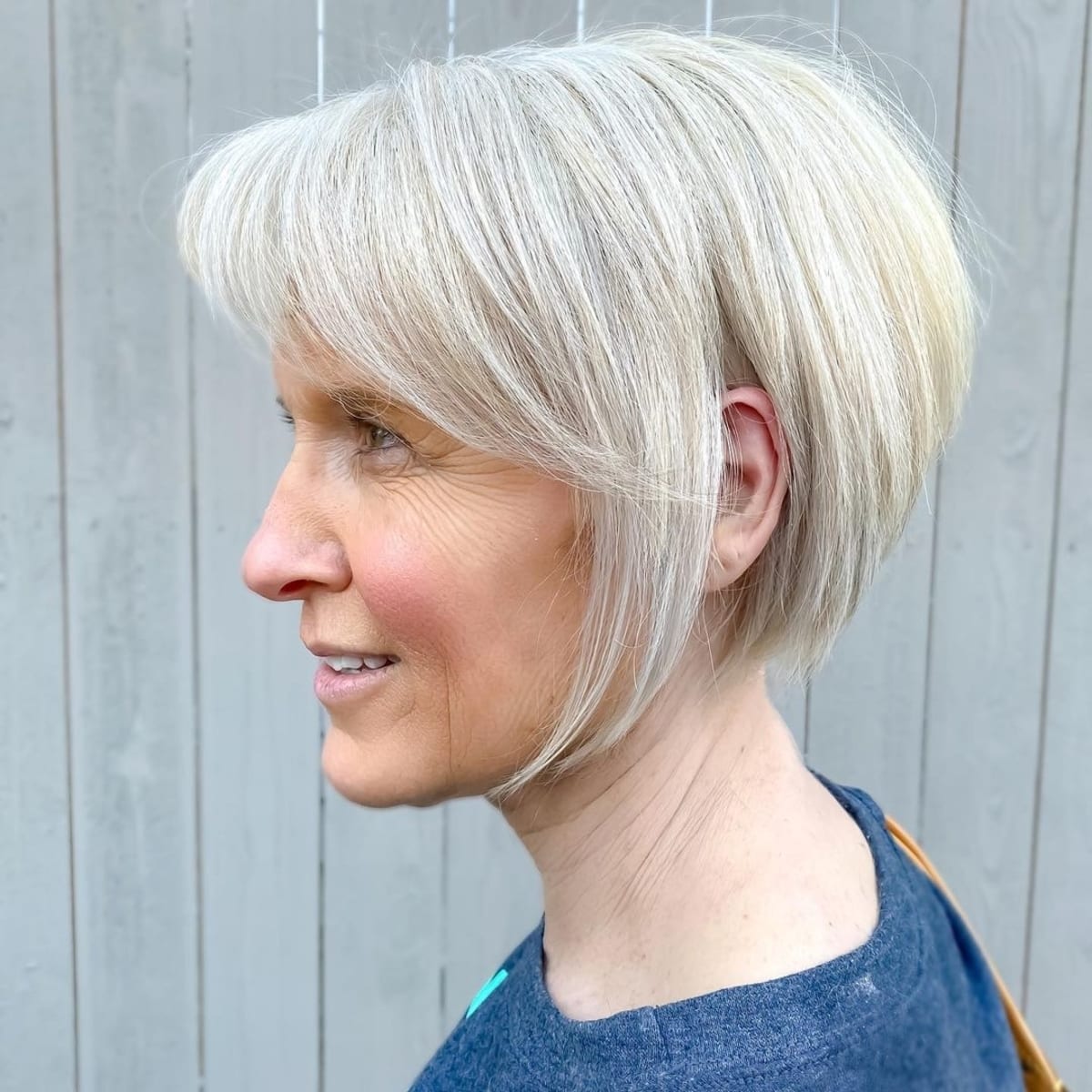 Bob hairstyle for women over 50 with layered, thin hair