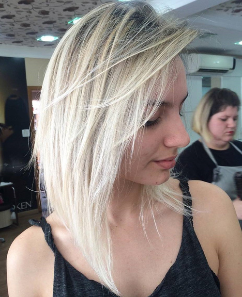 Blonde Layered Bob With Root Fade