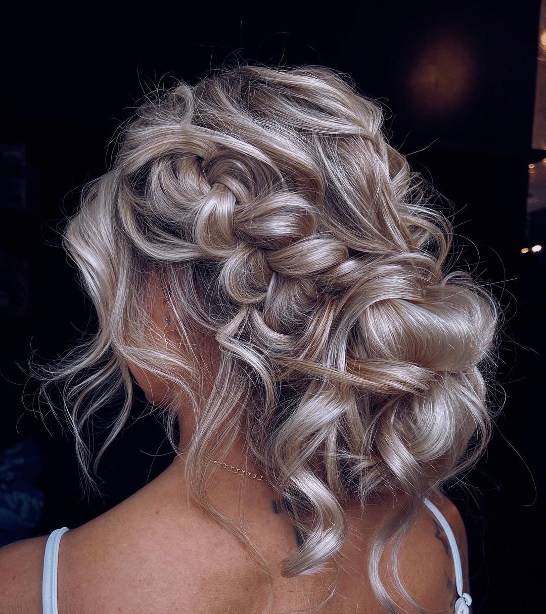 Effortless Disheveled Blonde Chignon