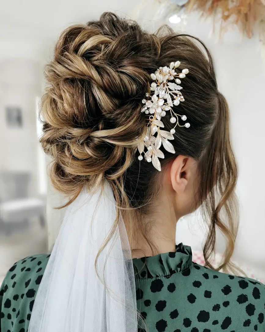 Voluminous Updo with a Veil Underneath