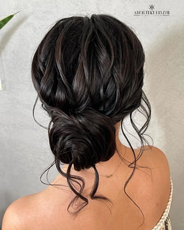 Sculptured Wavy Twisted Bun Updo