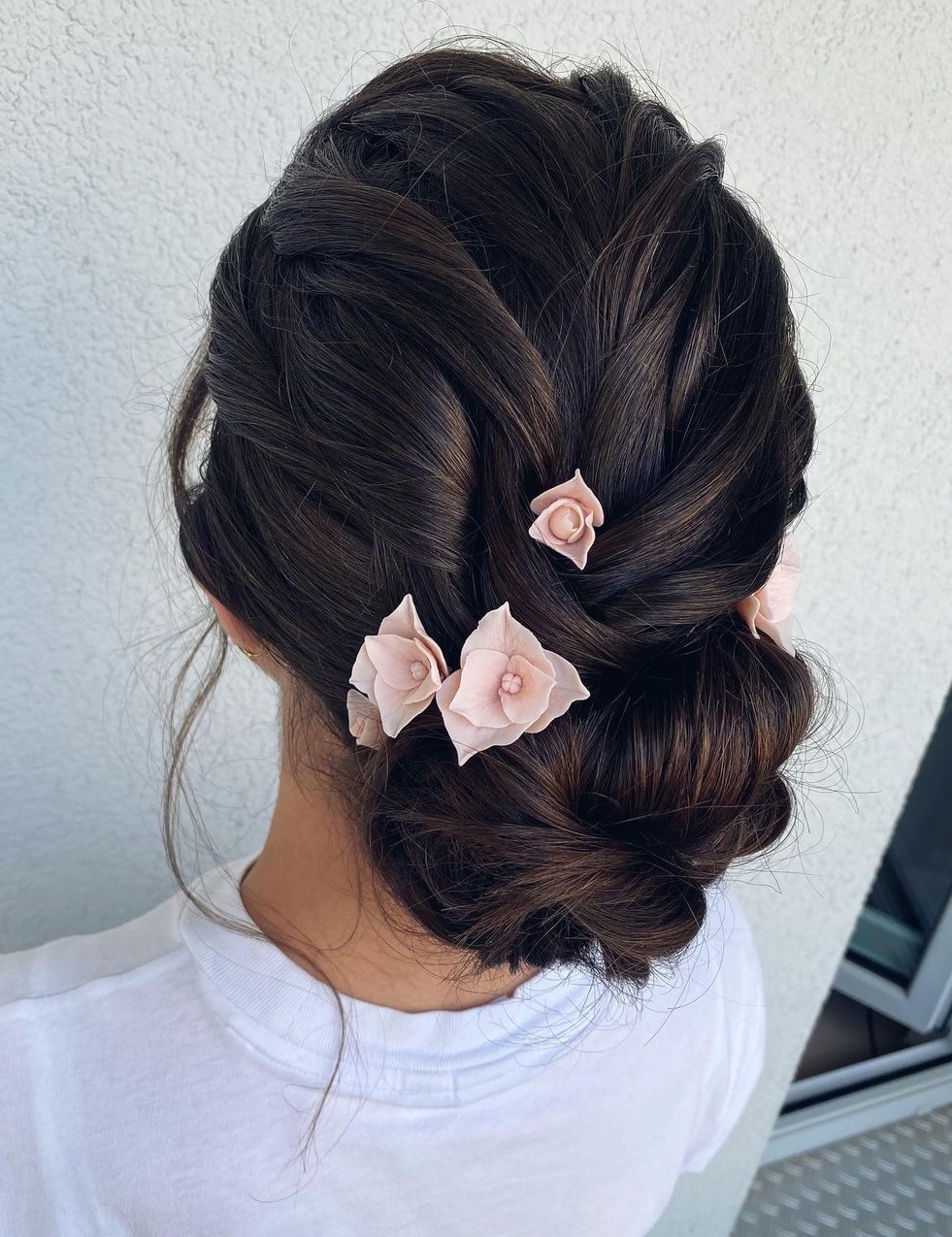 Low Bun with Flowers for Thick Hair