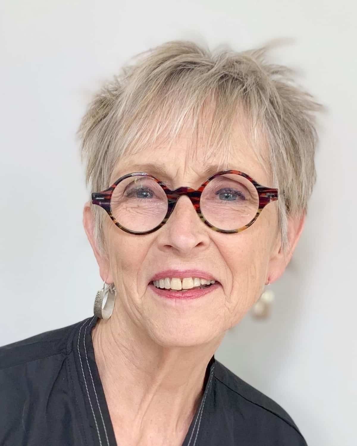 Pixie hairstyle for women over 60 with glasses