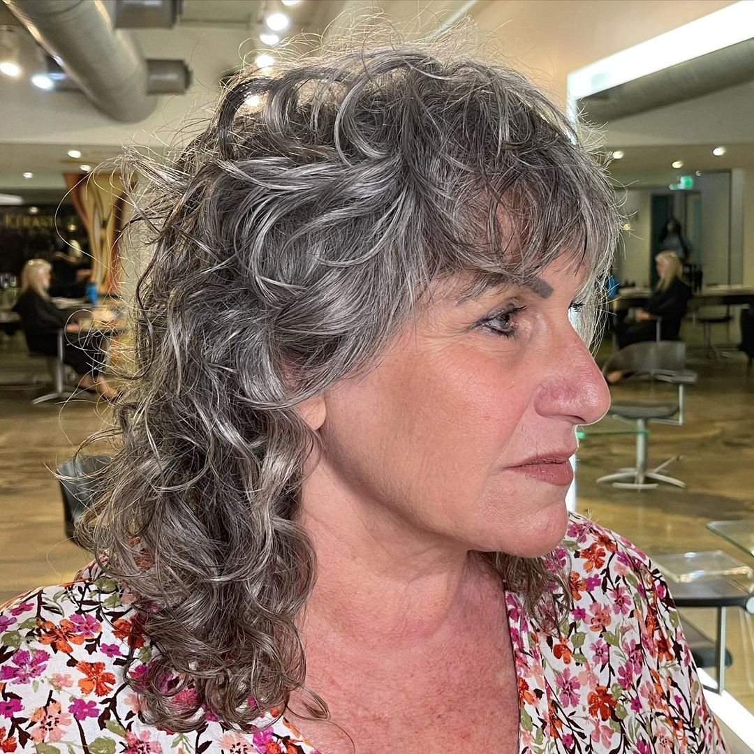 Flattering Curly Shullet on Salt and Pper Hair