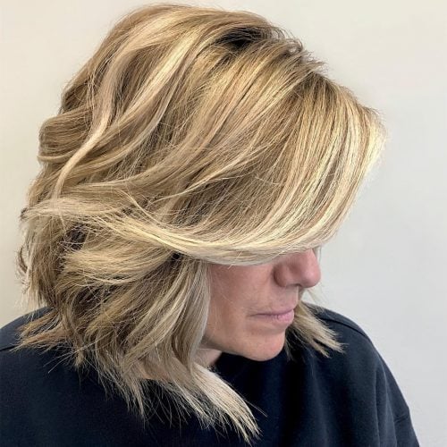 Balayage long blonde bob with bangs