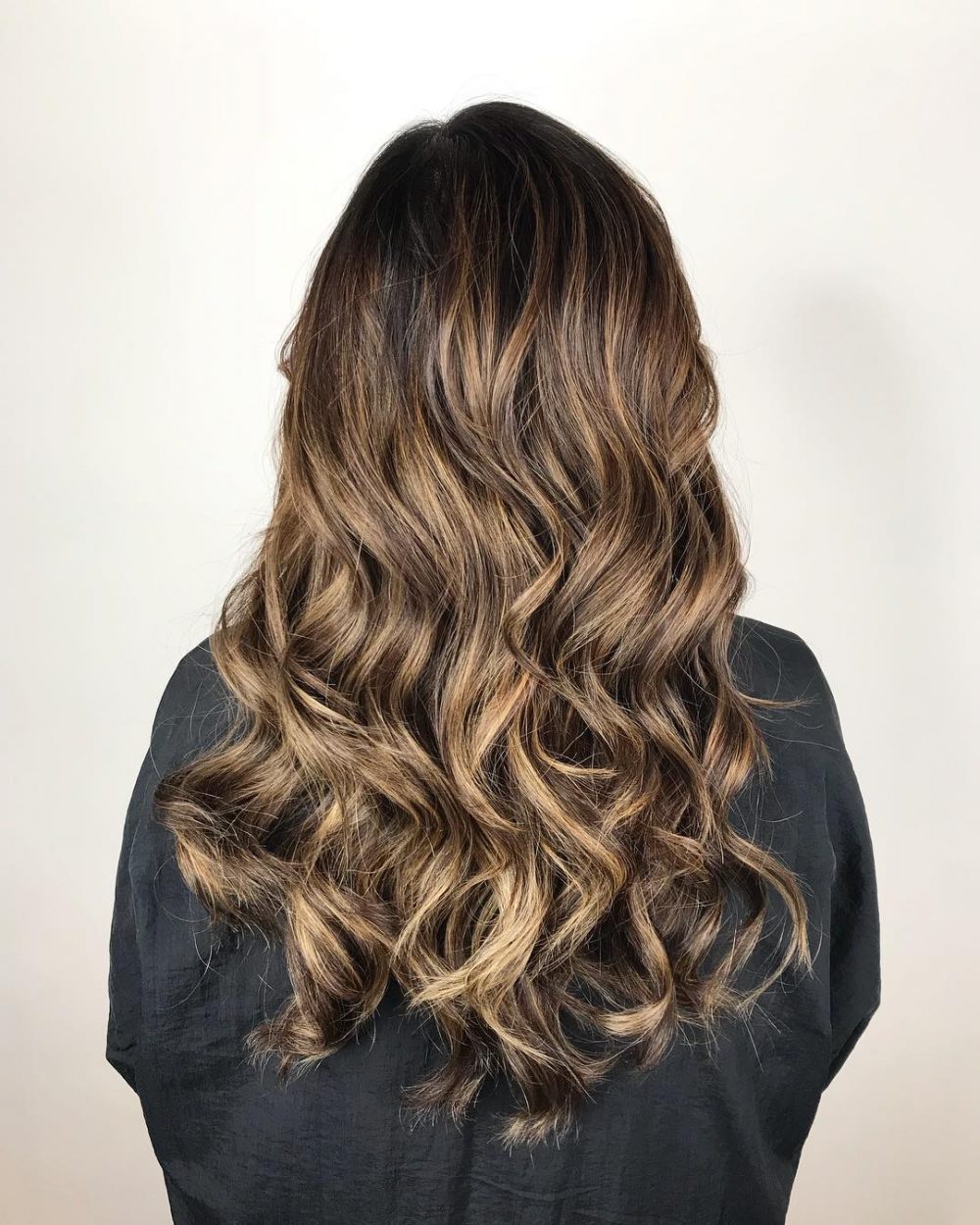 Honey Brown Toffee on Wavy Hair