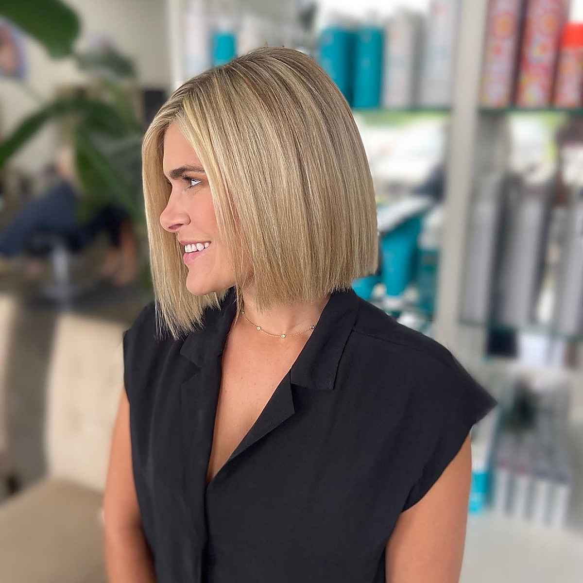 Stylish neck-length blonde blunt cut bob haircut