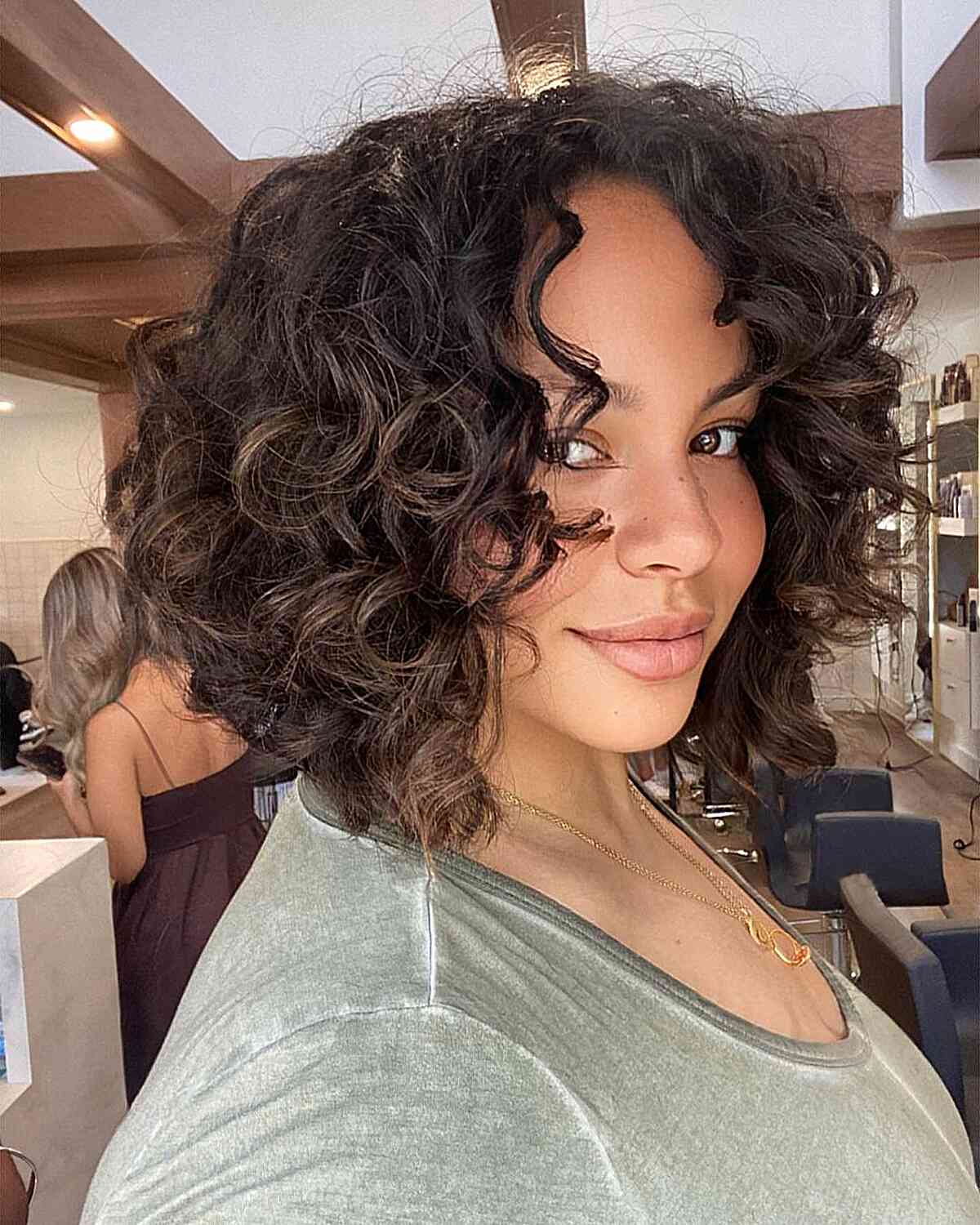 Neck-Length Curly Long Bob Cut on Ladies with Full and Round Faces