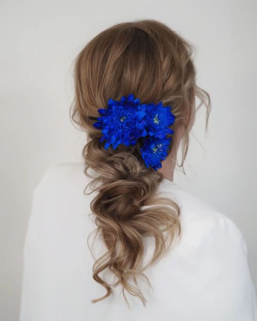 Side Ponytail Hairstyle with Flower